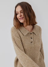 Knitted jumper made from a wool and alpaca blend. HardwickMD polo has a loose fit with collar and buttons in front, dropped shoulders, and long sleeves with a smaller, ribbed cuff. The model is 175 cm and wears a size S/36.