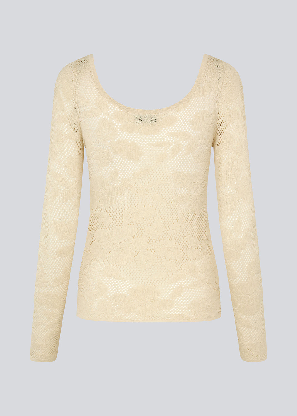 Tight-fitting top in beige in a stretchy lace material, that is slightly see-through. HawkinsMD top has long sleeves, and a deep neckline in front and back.