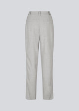 High-waisted pants in a woven quality with zip fly with hidden hook and bar closure. HeartMD pants has slanted side pockets and faux welt pockets in the back. Straight legs. The model is 175 cm and wears a size S/36.