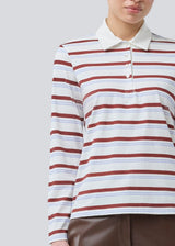Longsleeved t-shirt made from cotton jersey with stripes. HellenMD LS stripe t-shirt has a relaxed silhouette with wide sleeves and a round neck. The model is 175 cm and wears a size S/36.