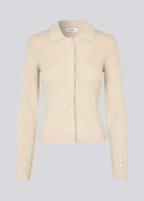 Fitted cardigan in beige made from a soft, rib-knitted wool. HirokiMD cardigan has a collar, buttons in front, and long sleeves with slit and buttons. The model is 175 cm and wears a size S/36.