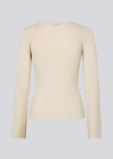 Fitted off white top made in a soft, rib-knitted wool. HirokiMD o-neck has long flared sleeves. The model is 175 and wears a size S/36.