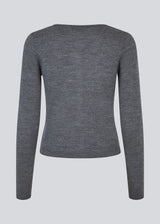 Fitted grey cardigan in soft knit. HirokiMD short cardigan has a round neck and a button closure in front. The model is 177 cm and wears a size S/36.