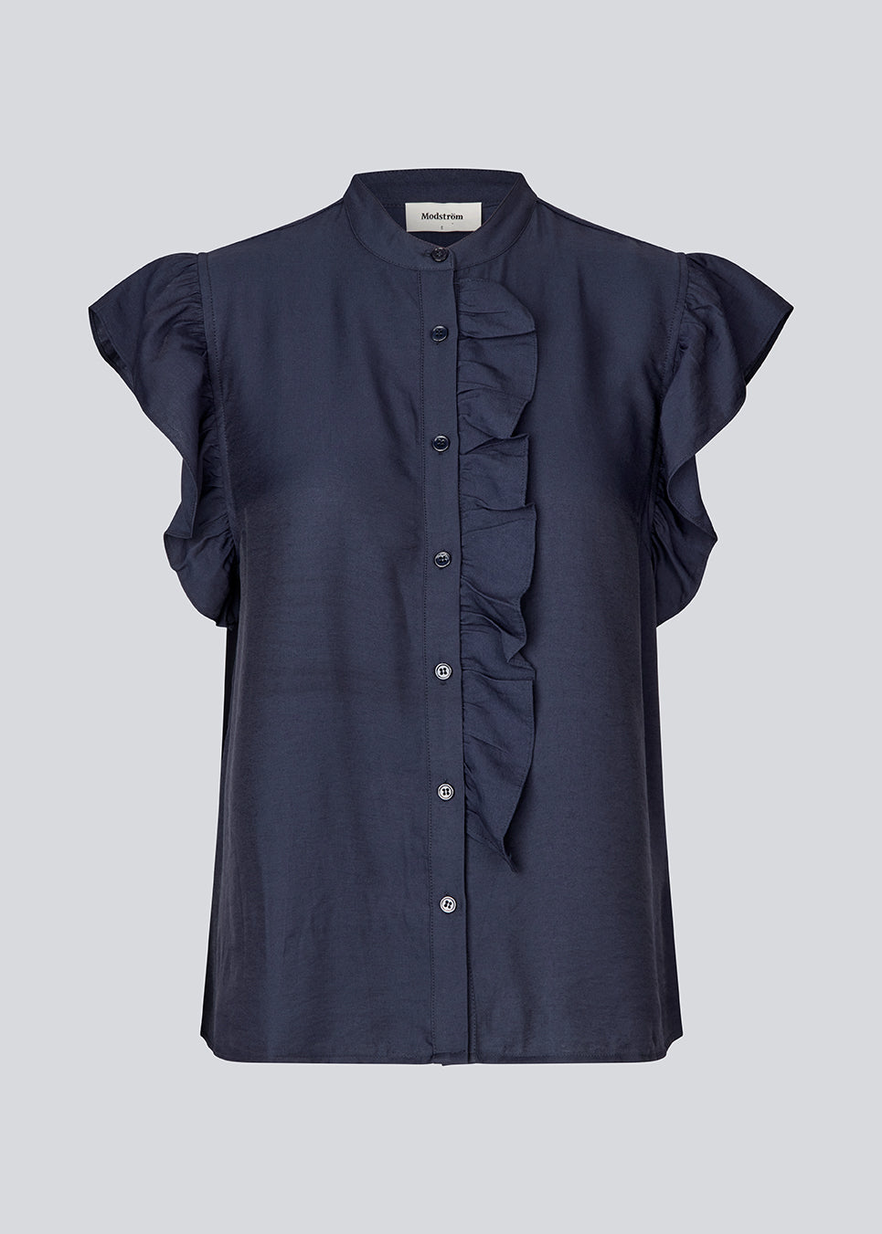 HolidayMD top in navy blue is designed with a standing collar and button closure in front. The top has a frilly detail along the placket and at the armholes. 