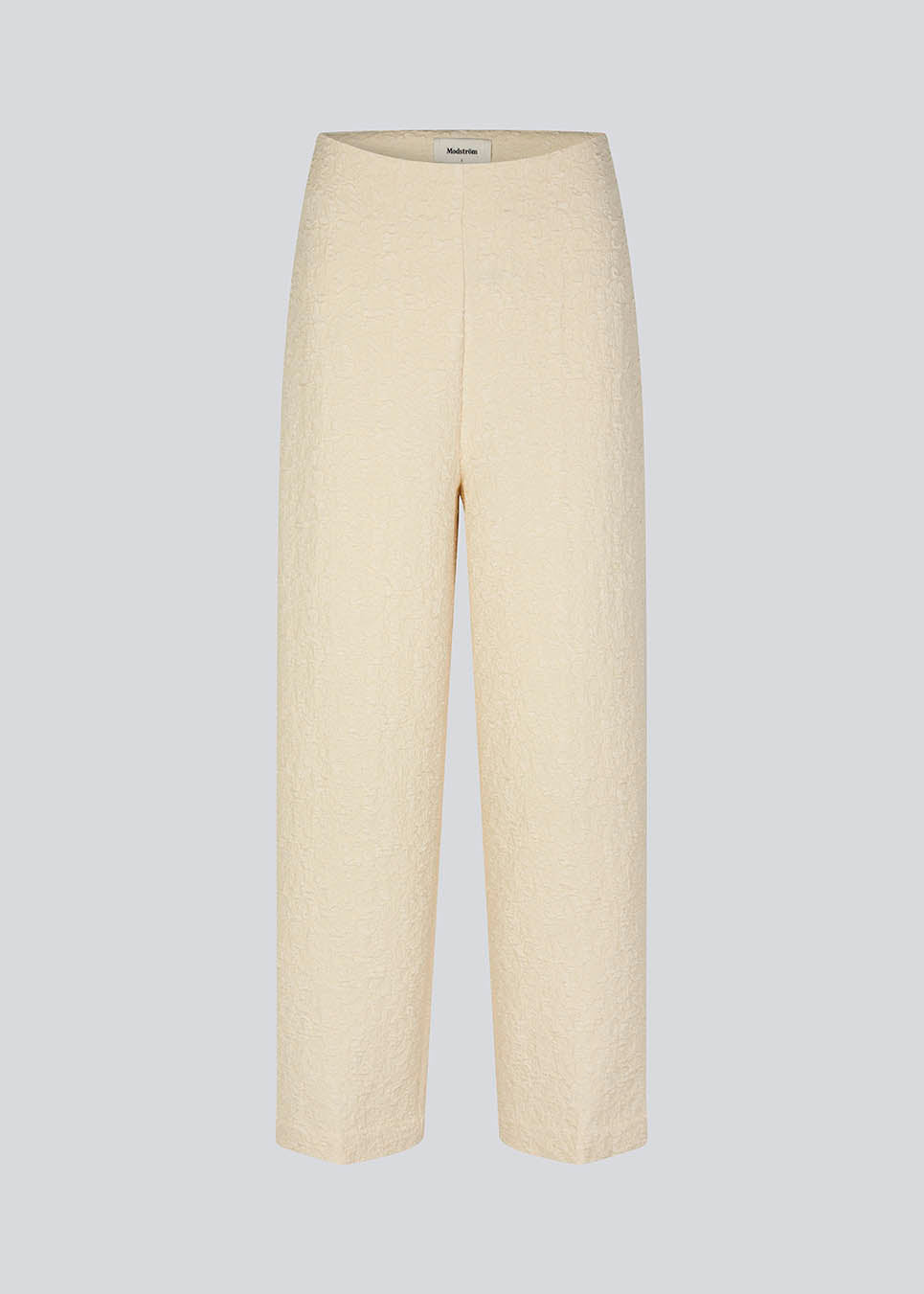 Pants with straight legs in a structured material. HollisMD pants have a medium waist with hidden zipper at one side, and two welt pockets on the back. 