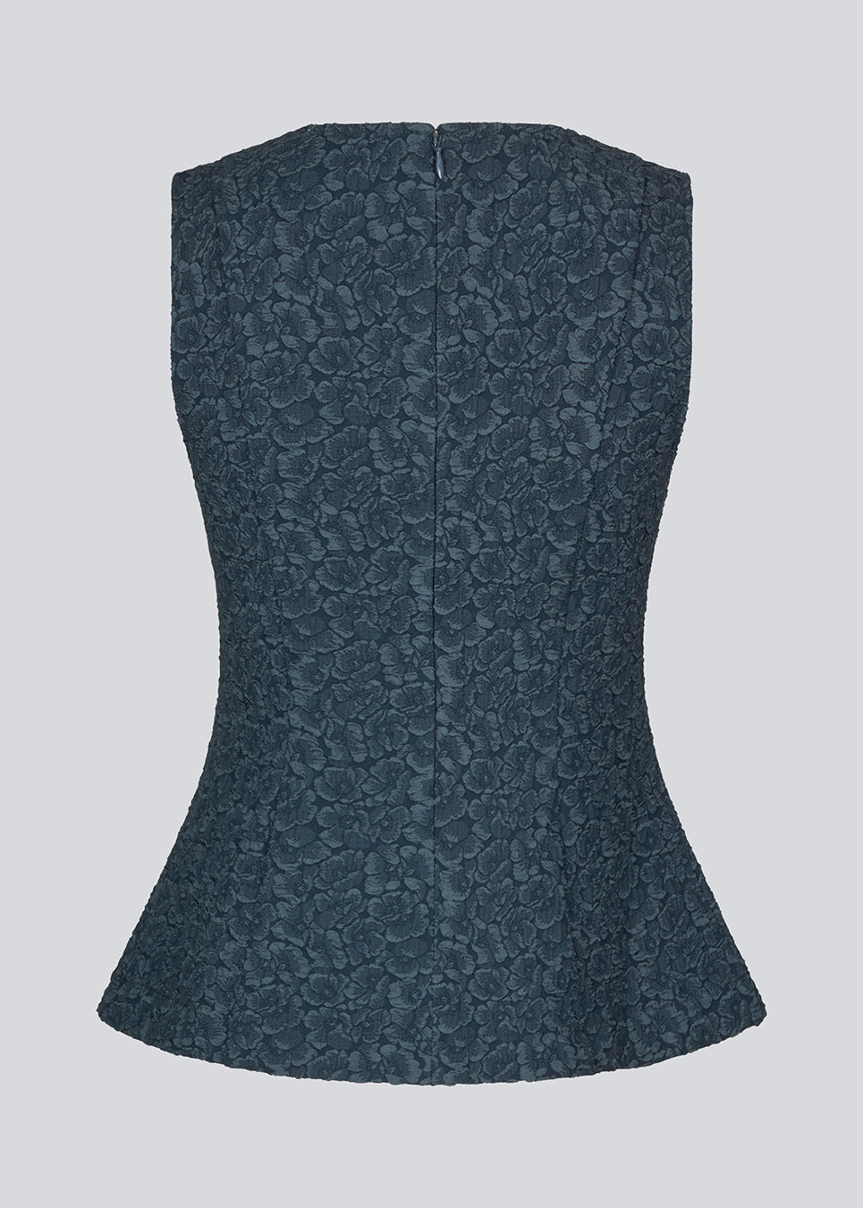 Tailored top in dark blue without sleeves made from a structured material. HollisMD top has a high v-shaped neckline with a hidden zipper at the neck. 