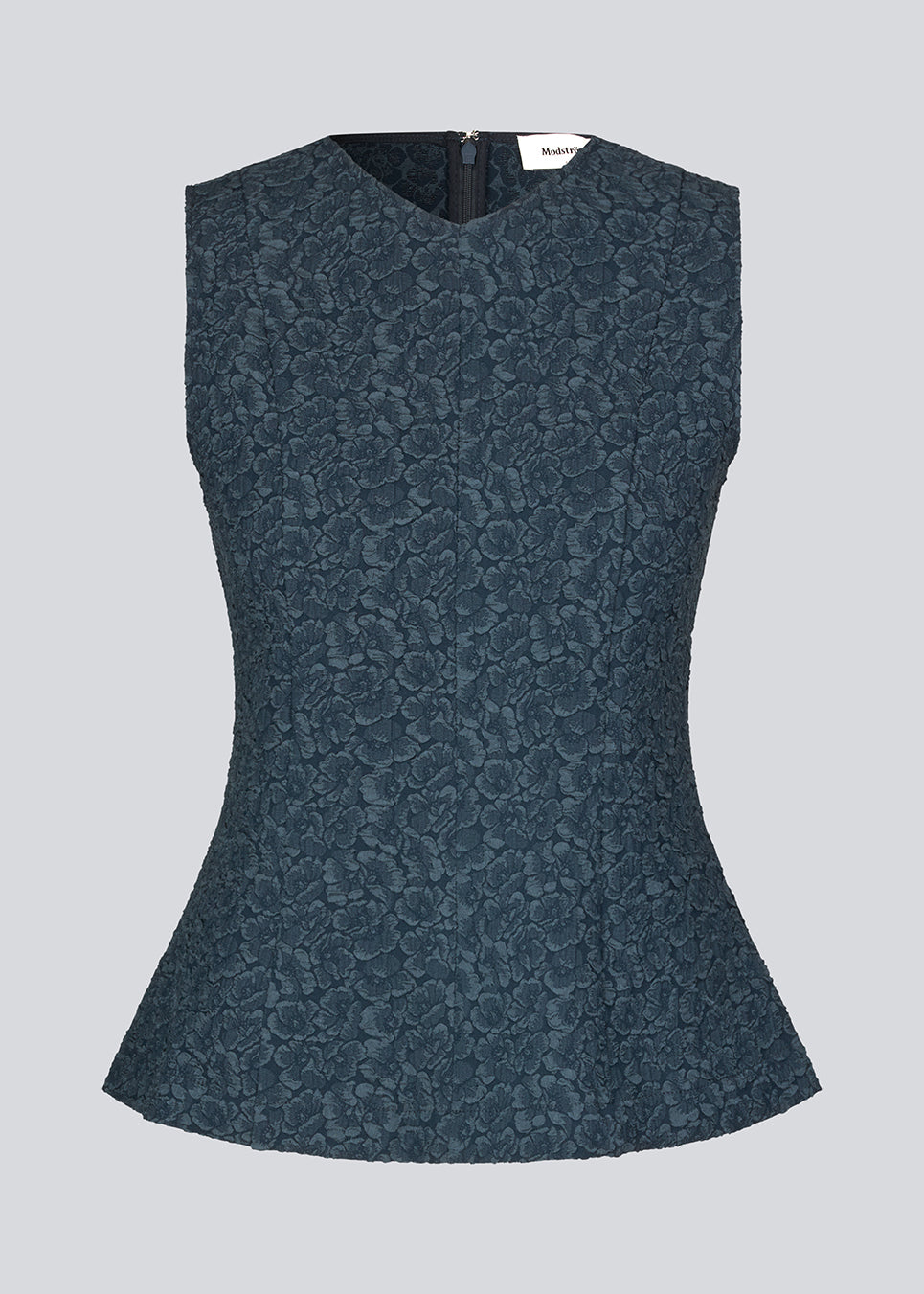 Tailored top in dark blue without sleeves made from a structured material. HollisMD top has a high v-shaped neckline with a hidden zipper at the neck. 