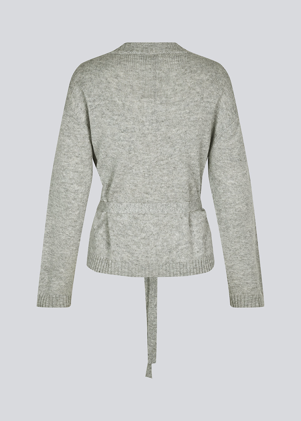 Loose knitted cardigan in 100% mercerized wool. HowieMD cardigan has a tie band in the waist and long loose sleeves.