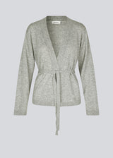 Loose knitted cardigan in 100% mercerized wool. HowieMD cardigan has a tie band in the waist and long loose sleeves.