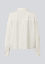 Shirt in a light EcoVero viscose with a loose fit. HudgesMD shirt has a collar, button closure in front, and long sleeves with cuff.