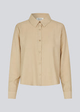 Shirt in beige in a light EcoVero viscose with a loose fit. HudgesMD shirt has a collar, button closure in front, and long sleeves with cuff. 