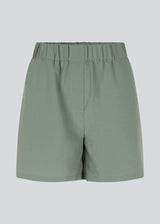 Shorts in soft green with a loose silhouette in a recycled material. HuntleyMD shorts has a medium waistline with covered elastication. 