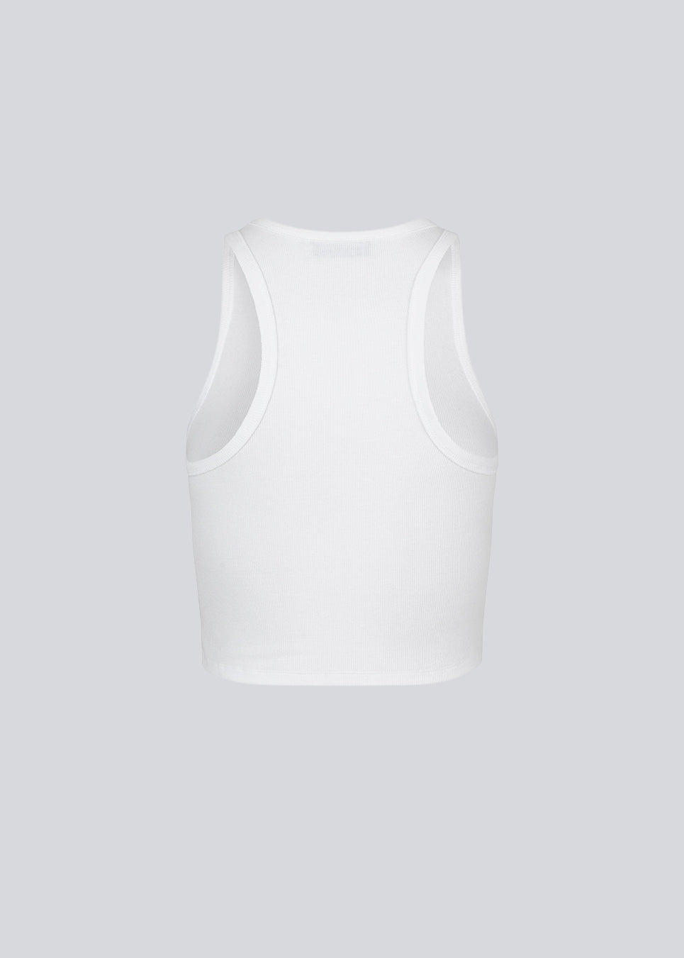 Basic top cut from a soft ribbed jersey fabric. IgorMD crop top in the color Off White is styled with a slim fit and cropped fit with racer-shaped back. Perfect for a sporty look. The model is 173 cm and wears a size S/36