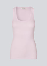 Sleeveless top in ribbed cotton jersey. Igormd tank top has a tight fit and a round neckline. fit with long sleeves.