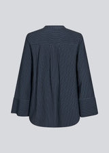 Navy shirt with copped sleeves and a slit. IsabelMD shirt has a hidden button closure and a high neck.