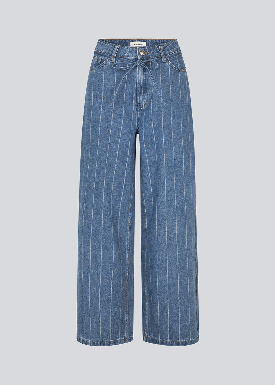 Jeans with wide legs in cotton denim. IsoldeMD jacquard pants have a high waist, front and back pocketsand a tie band at the waist. The jeans have stripes. 