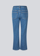 Flared jeans with of cotton denim. IsoldeMD solid cropped jeans have a high waist, zipper fly, and front and back pockets.