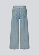 Jeans with wide legs in cotton denim in a light blue wash. IsoldeMD pants have a high waist, front and back pockets and a tie band at the waist.