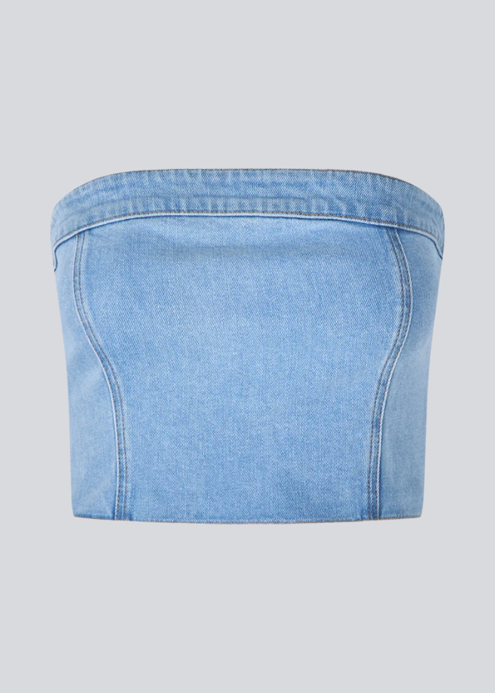 Short denim top in a corset design. IvannaMD top in made in light colored denim and is closed with a zipper at the back.