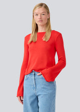 Knitted top with long flared sleeves and a wide neckline. IvonneMD o-neck has a normal fit.