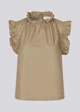 Loose top in light brown with a ruffle detail at the sleeves and neck. IzakMD top is sleeveless and has a hidden zipper in the back. 