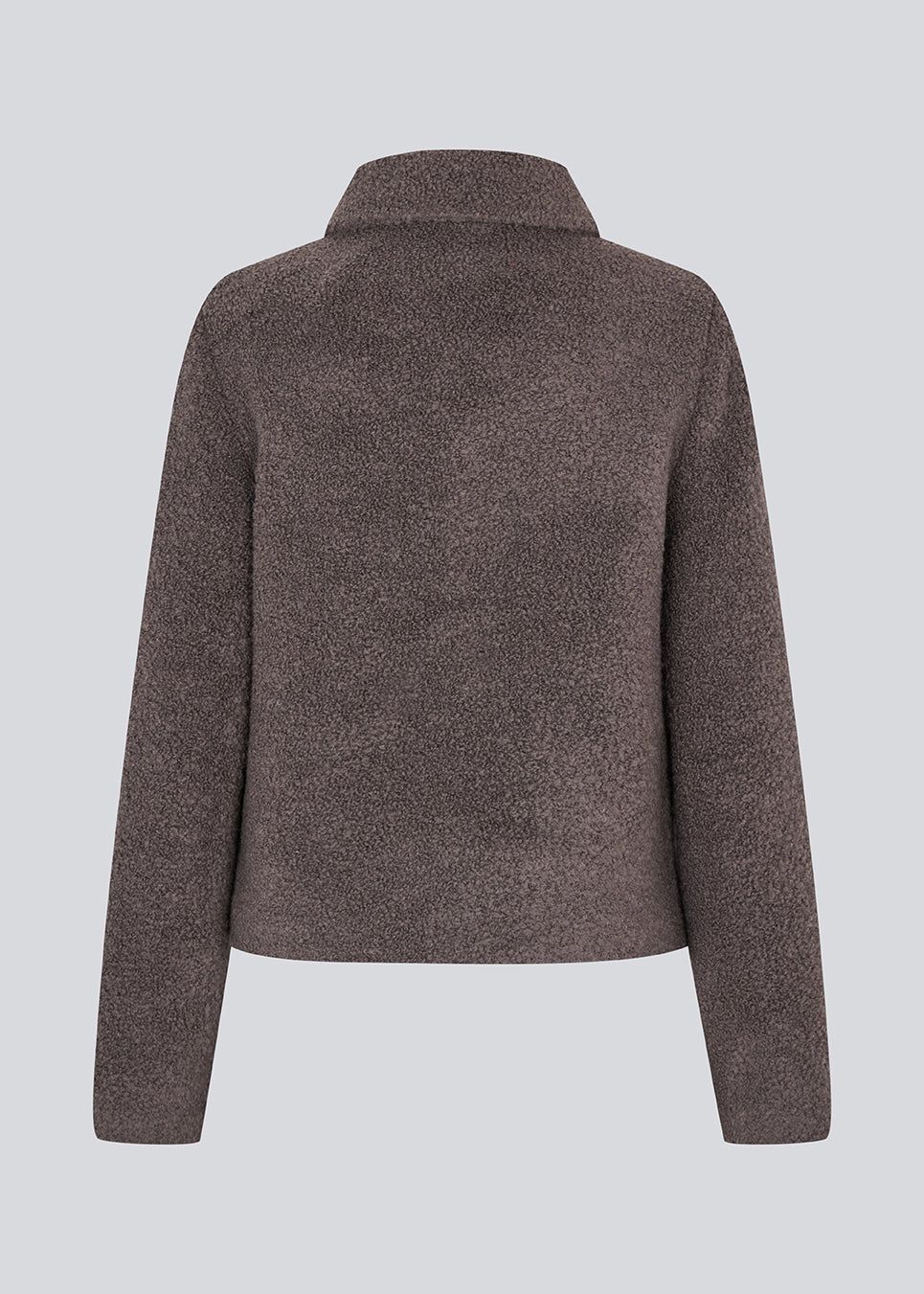 Short jacket in a wool mix. JustyMD short jacket has a loose fit, button closure and to pockets in front.