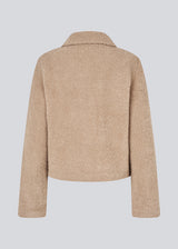 Short beige jacket in a wool mix. JustyMD short jacket has a loose fit, button closure and to pockets in front.