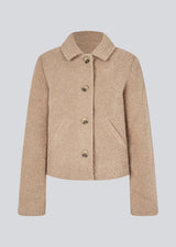 Short beige jacket in a wool mix. JustyMD short jacket has a loose fit, button closure and to pockets in front.