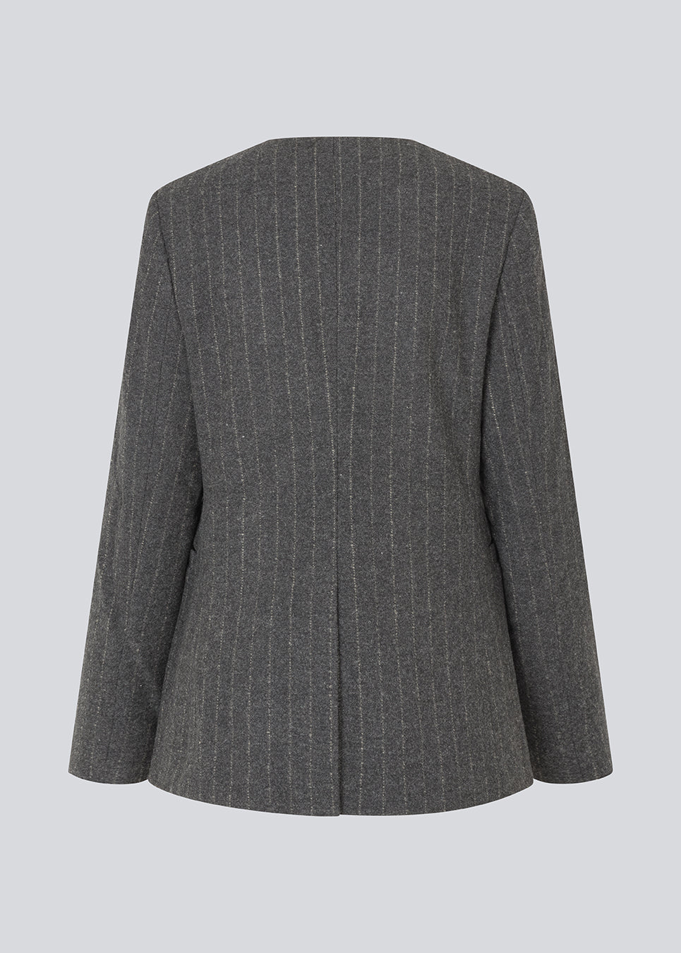 Fitted dark grey blazer in a pinstriped wool mix. KristolMD blazer has shoulder pads, two pockets in front, lining and a slit in the back.