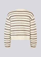 Oversized and striped knit with a round neck. LineusMD o-neck has long wide sleeves and dropped shoulders. The model is 177 cm and wears a size S/36.