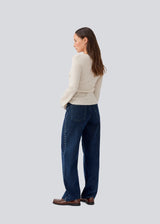 Classic jeans with wide legs and metal studs on the sides. LuccaMD jeans has a zipper, side pockets and two back pockets