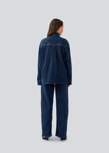 Classic shirt in denim with metal studs details. LuccaMD shirt has a shirtcollar, two front pockets and a button closure.