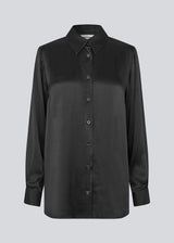 Black long sleeveless shirt in satin. LucillaMD long dress has a v-neck and a scarf at the neck.