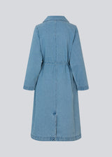Oversized double-breasted trench coat in denim. MadelineMD denim jacket has dropped shoulders, long wide sleeves and a tieband at the waist.