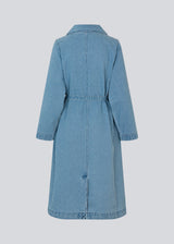 Oversized double-breasted trench coat in denim. MadelineMD denim jacket has dropped shoulders, long wide sleeves and a tieband at the waist.
