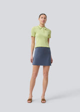 Fitted green polo in jersey. MagdaloneMD polo has short sleeves and babylock edges. 