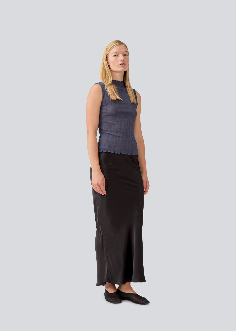 Maxi skirt in satin. MalkiMD skirt has an a-facon and an elastic in the waist.