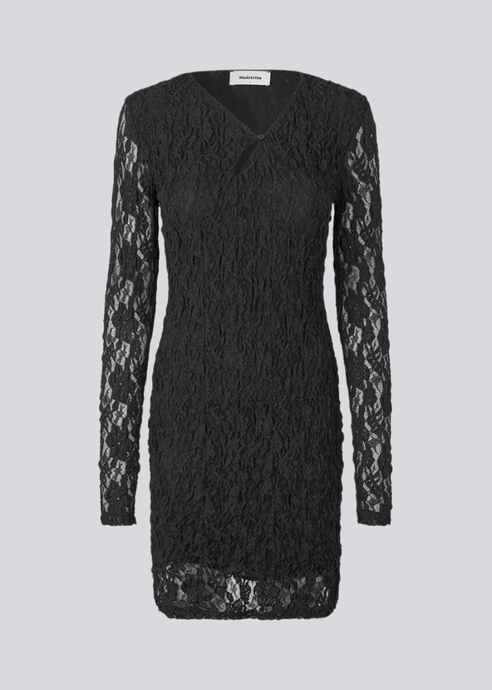 Short fitted dress in an elastic lace material. MalmunMD dress has an asymmetric neckline with an opening with button closure.