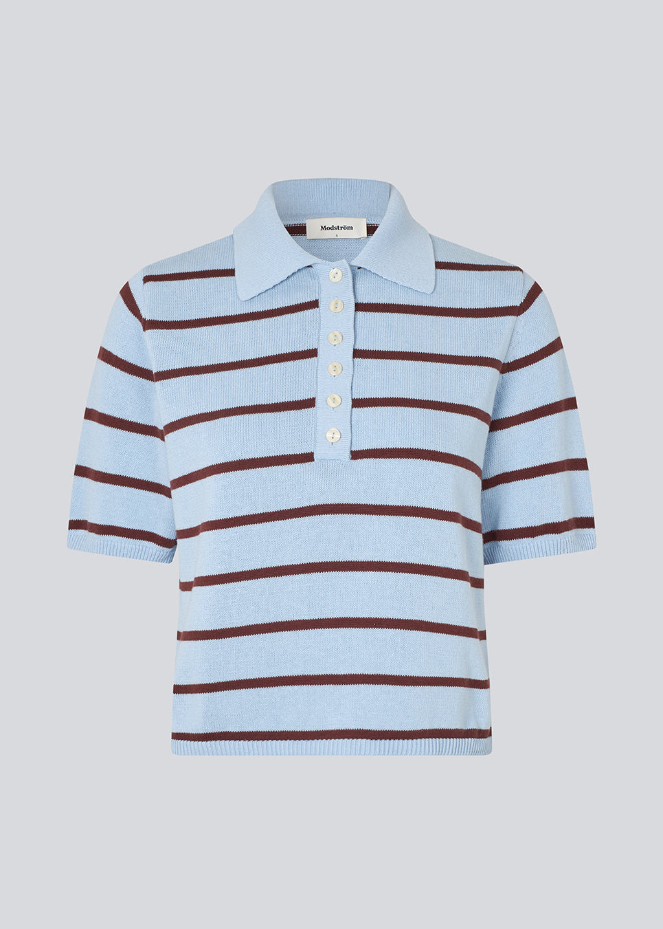Soft knitted polo in plain jersey knit. MalvaMD stripe polo has a collar and a buttonclosure in front and short sleeves.