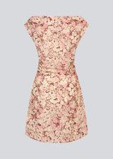 Fitted dress with asymmetrical sleeves. MeliaMD print dress has pleats and an invisible zipper on the side.