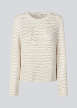 Crochet top in organic cotton. MieMD top has detailed trimmings and long wide sleeves.