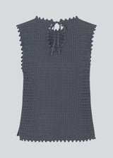 Crochet top in blue without sleeves in organic cotton. MieMD top has detailed trimmings and a deep v-neckline in the back with a tieband closure. The model is 177 cm and wears a size S/36.