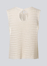 Crochet top without sleeves in organic cotton. MieMD top has detailed trimmings and a deep v-neckline in the back with a tieband closure