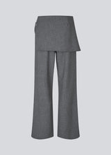 Loose pants with a wrap skirt. MikkelineMD pants has a high waist, invisible zipper at the side and is closed with a thin belt at the side.