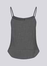 Sleeveles top with thin straps and a button closure. MikkelineMD top has two pocket and a hidden button closure in front.
