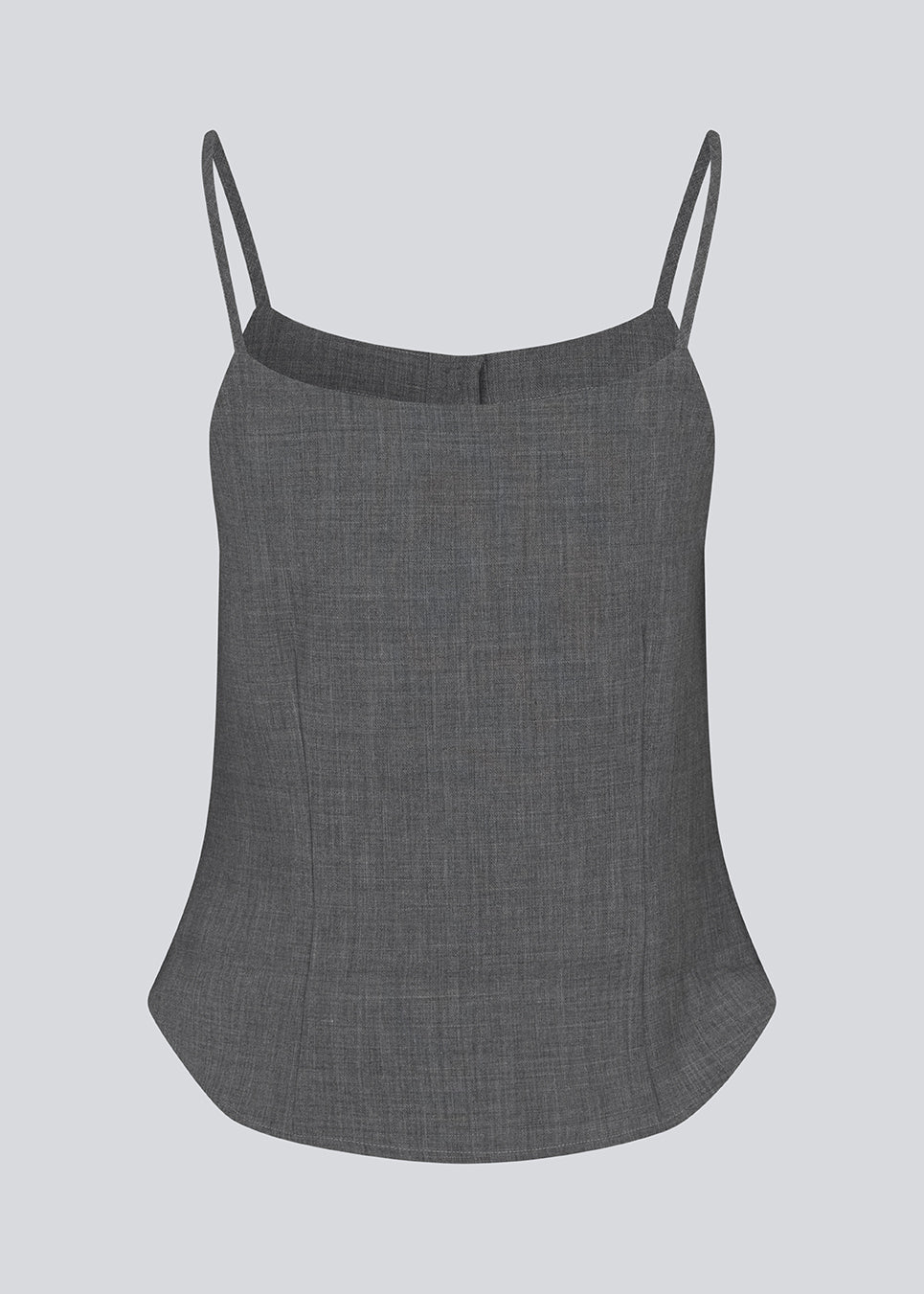 Sleeveles top with thin straps and a button closure. MikkelineMD top has two pocket and a hidden button closure in front.