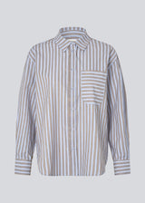 Classic shirt with an opening in the back and bow details. MilleMD stripe shirt has a oversize fit and a cuff with button closure. 