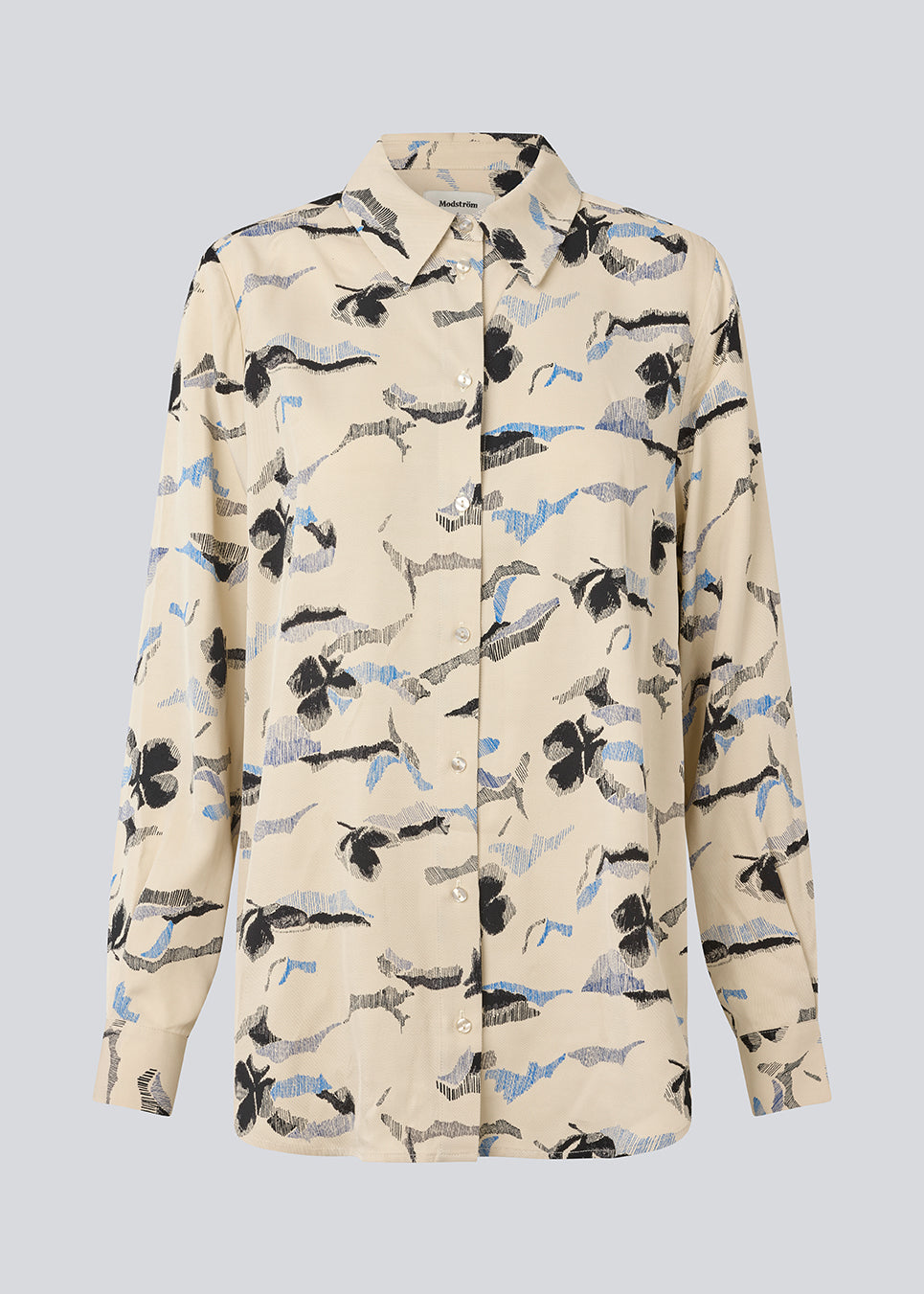 Classic shirt with a loose fit. MistMD print shirt has long sleeves, collar and a button closure in front.