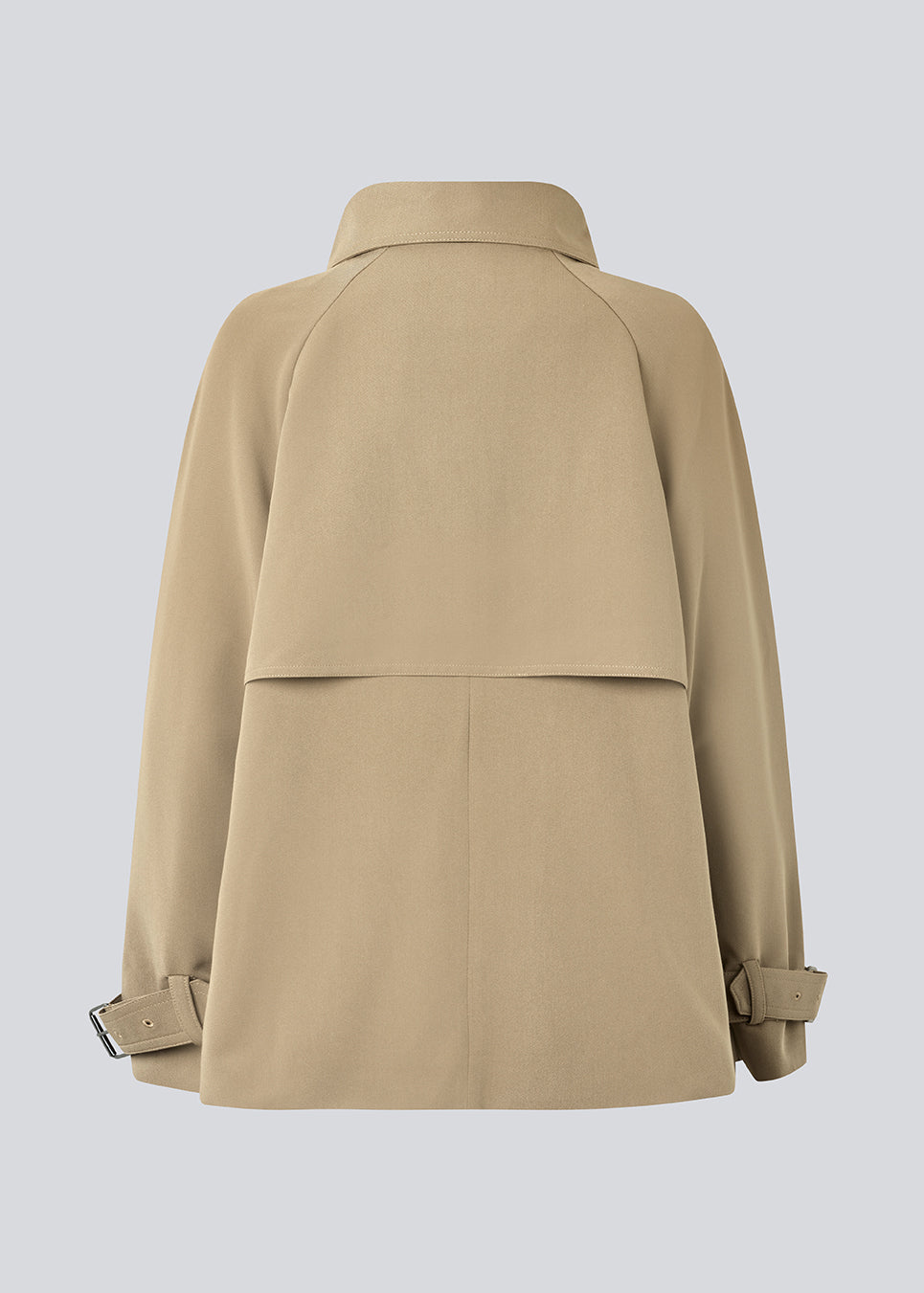 Loose double breasted jacket with button closure. MorganMD jacket has a high neck and wide sleeves with adjustable straps.
