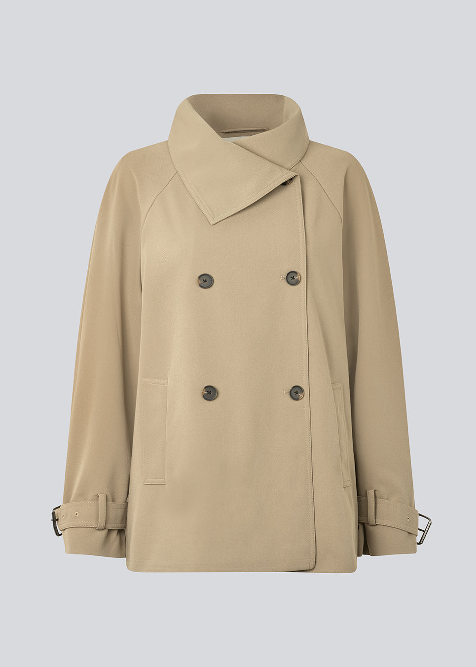 Loose double breasted jacket with button closure. MorganMD jacket has a high neck and wide sleeves with adjustable straps.